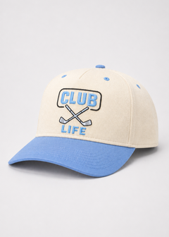 Beige and blue baseball cap with 'Club Life' text on a light gray background