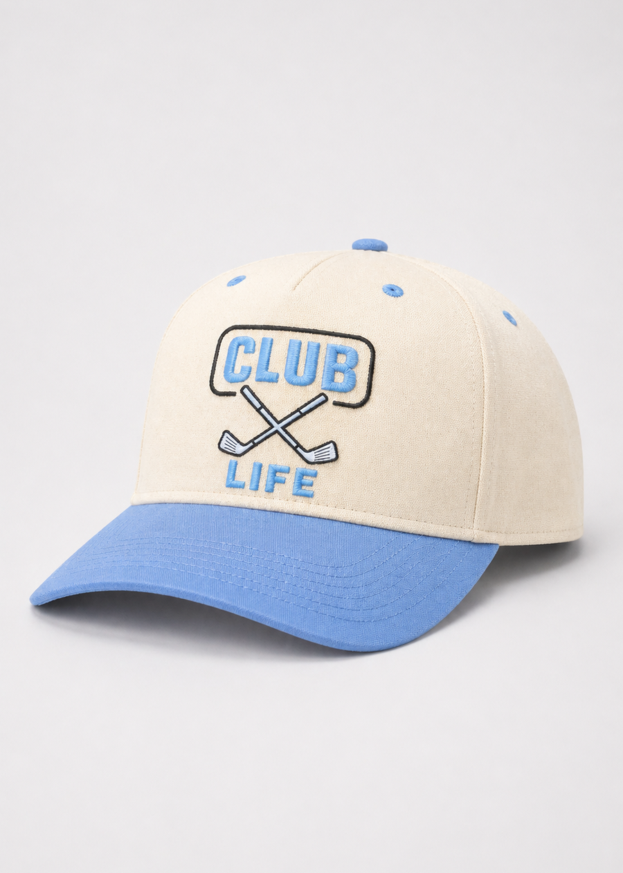 Beige and blue baseball cap with 'Club Life' text on a light gray background